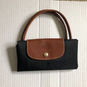 Les Pliages Longchamp Cabas brown leather top handle foldable black nylon tote